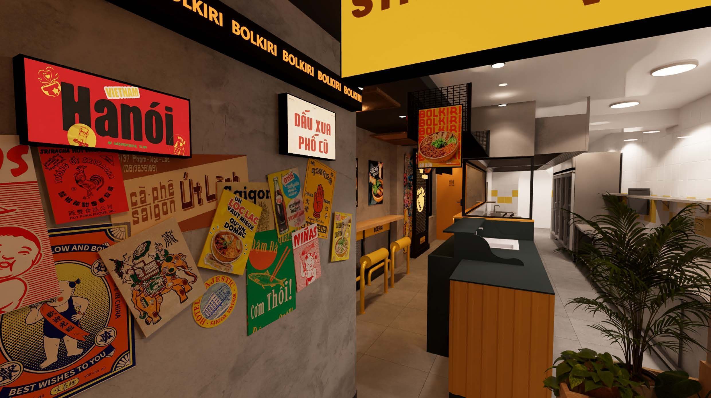 Intérieur d'un restaurant asiatique avec des affiches colorées sur les murs et un comptoir en bois.